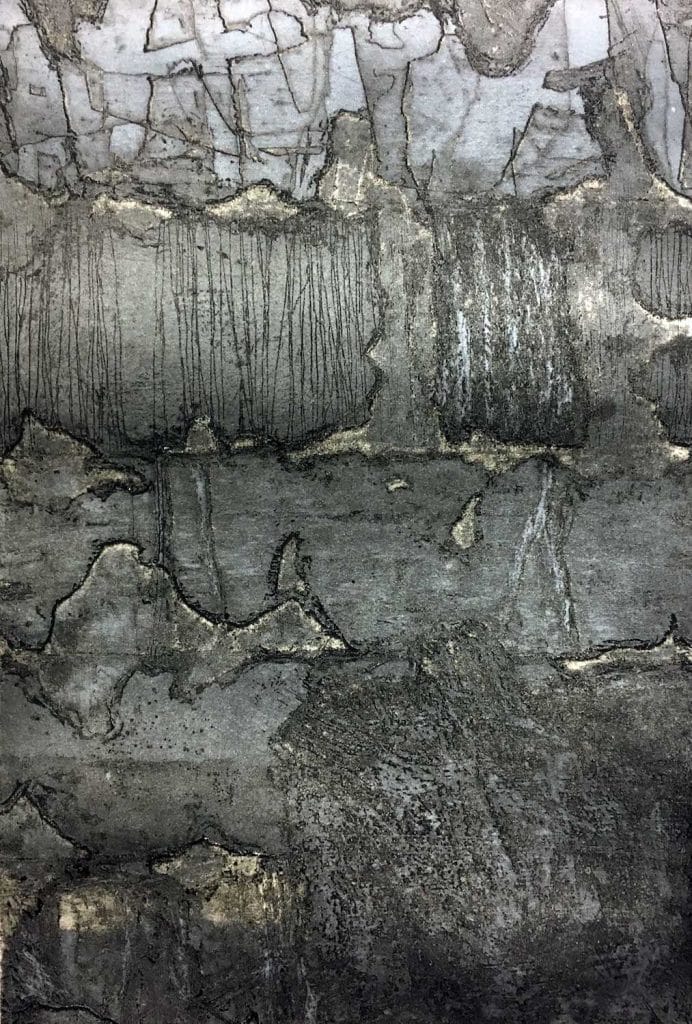 Abstract artwork with textured gray and black surface, resembling a weathered wall or rock.