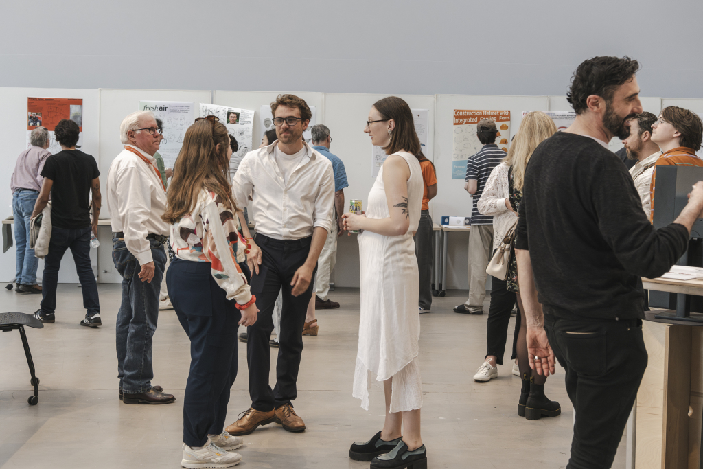 People gather to talk at the Industrial Design Show.