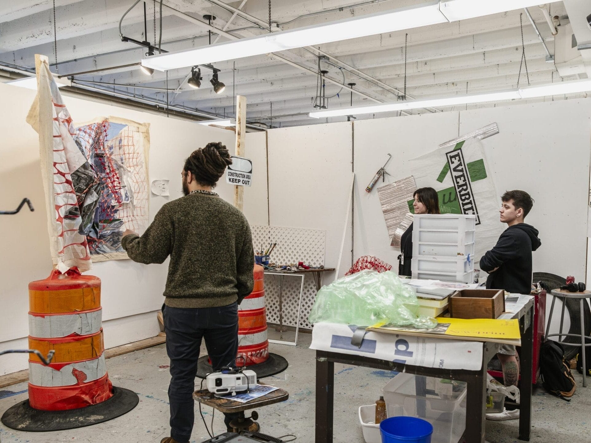 Students convene in a graduate studio space