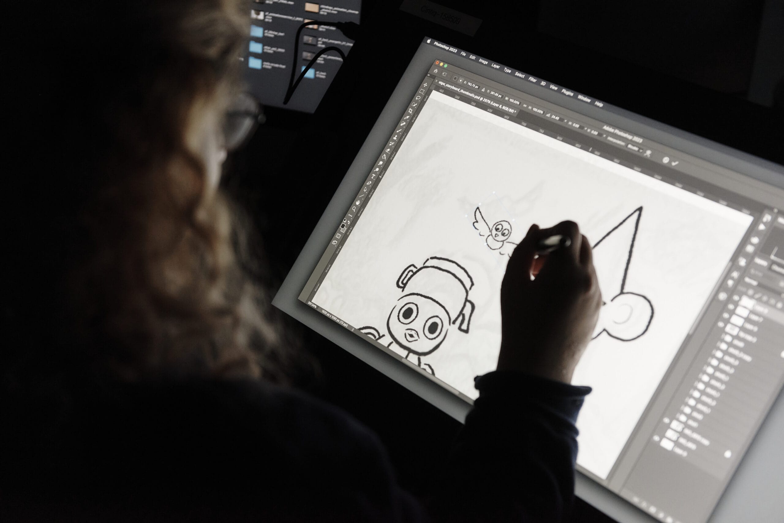 Student drawing on a tablet