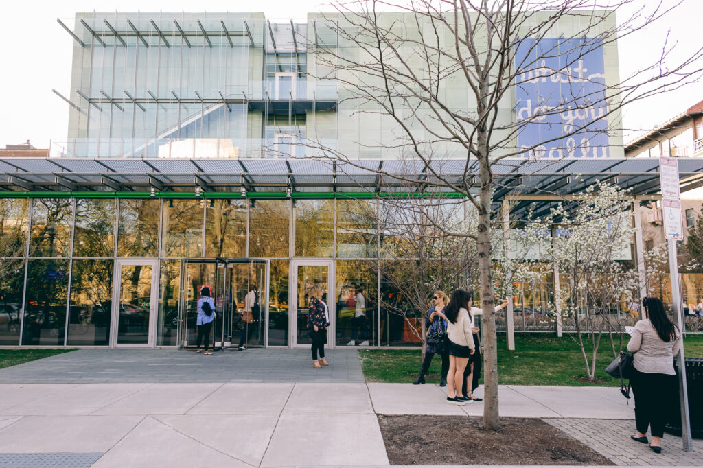 Side view of the glass entrance to the Isabella Stewart Gardner Museum