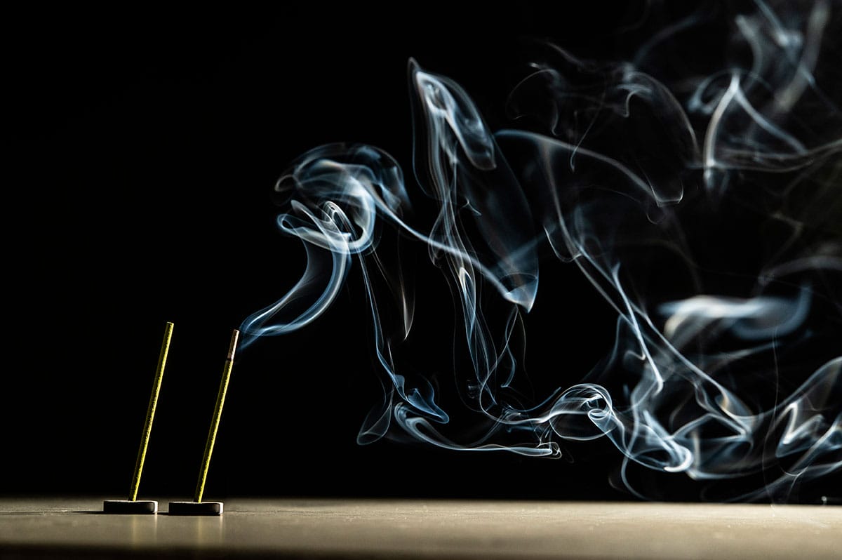 Smoke billowing from incense