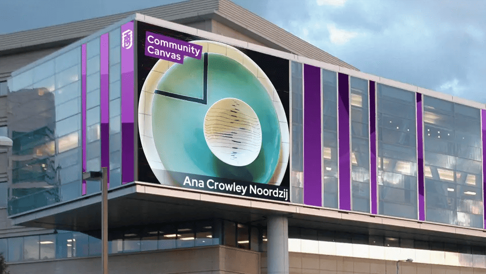 Mural on side of building.