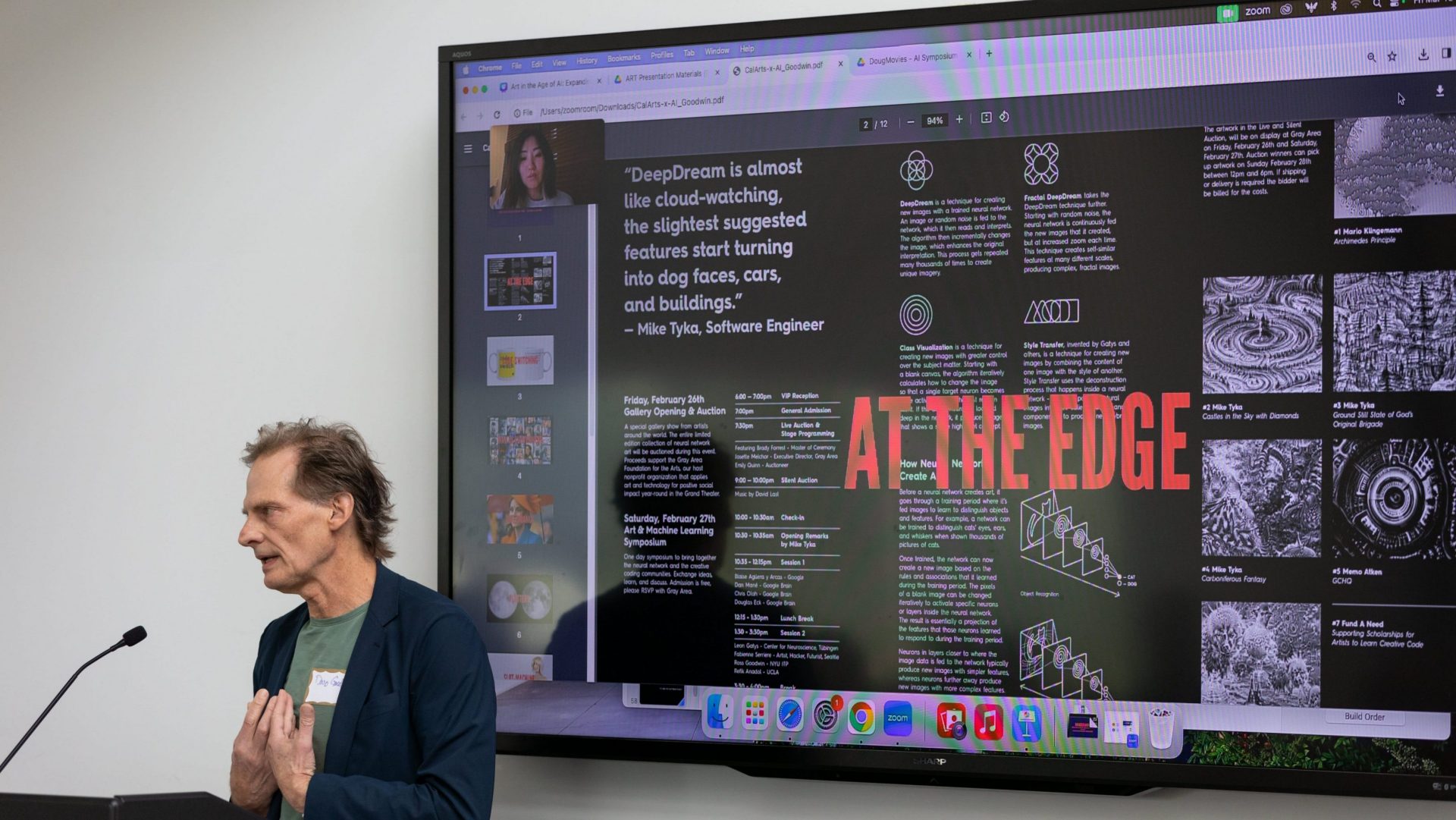 A man speaks at a podium in front of a large screen displaying a presentation on DeepDream and AI in Creative Practice, featuring diagrams, images, and the phrase AT THE EDGE in bold red text. A video call participant from MassArt is visible in the corner.